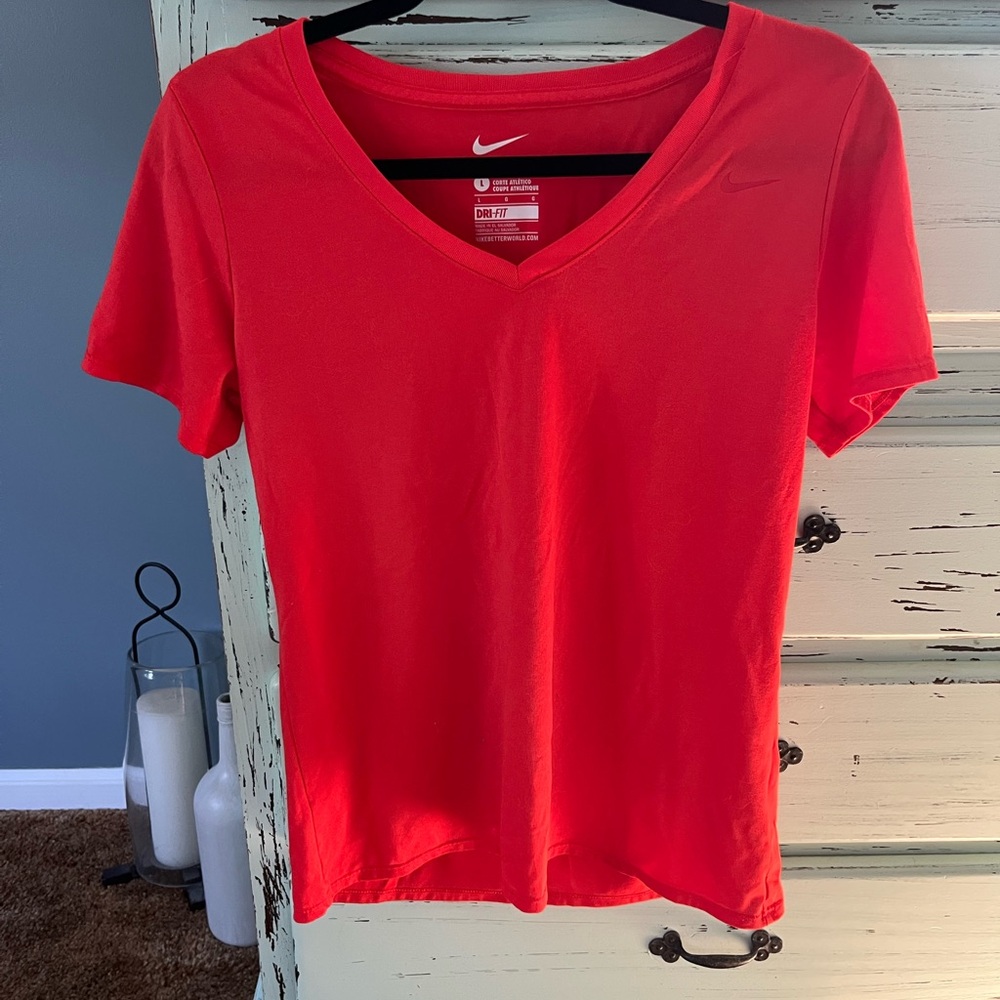 Nike Women's dark peach dri-fit V-Neck Top. Size large.